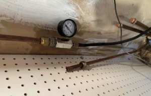 Gas line pressure testing during leak inspection